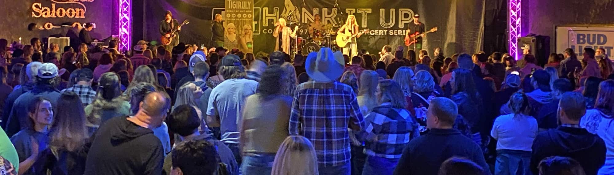 country concert with fans wearing cowboy hats San Antonio